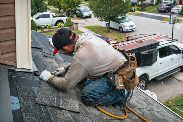 Professional Roofing technician working in Riverside, OR